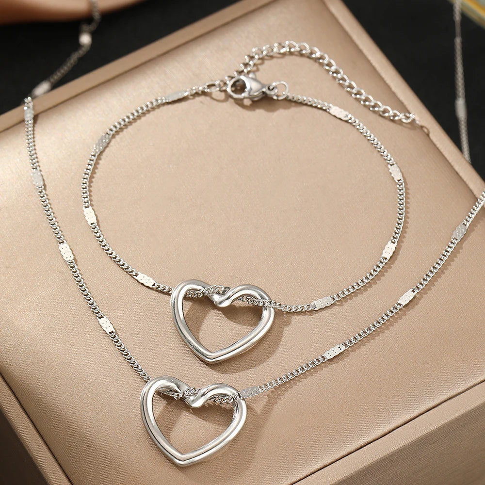 Lumière Heart™ – Set da gioielli a cuore attorcigliato