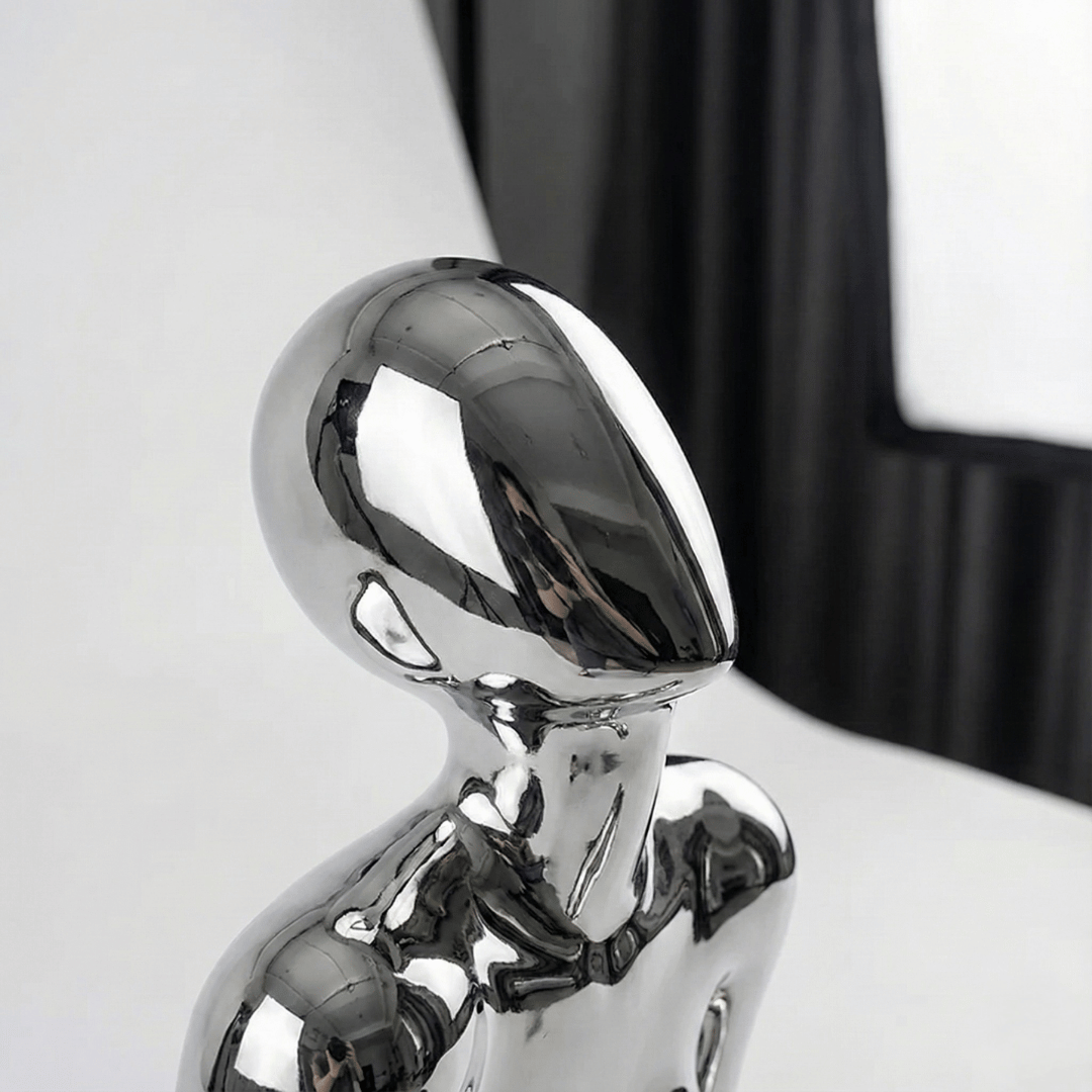 CHROME REVERIE | Seated Figure Sculpture