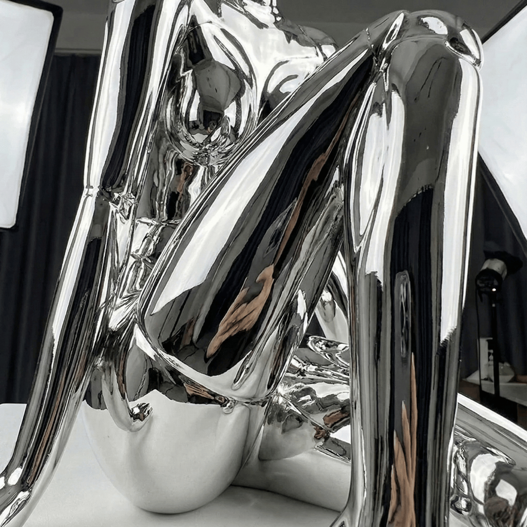 CHROME REVERIE | Seated Figure Sculpture