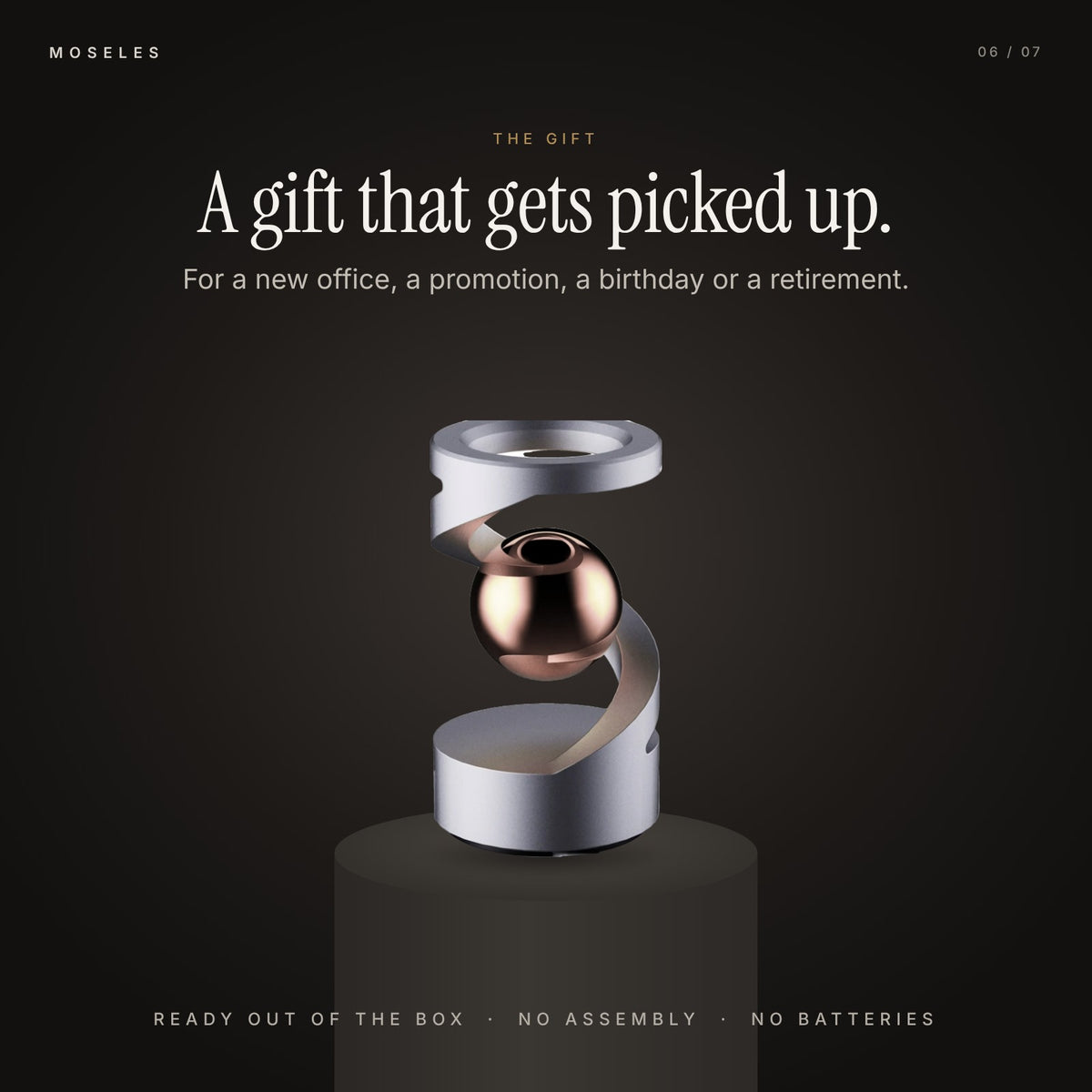 Levitation spinner in Gray Rose Gold on a dark plinth, shown as a gift